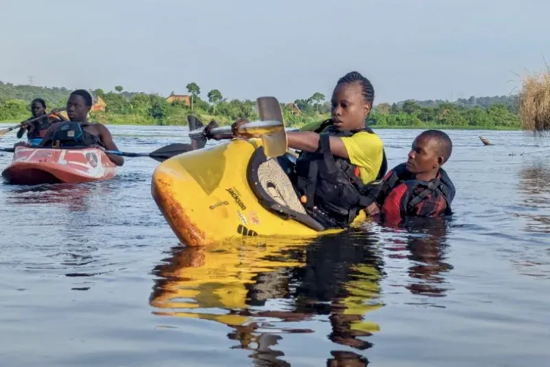 Woman focusing on paddling